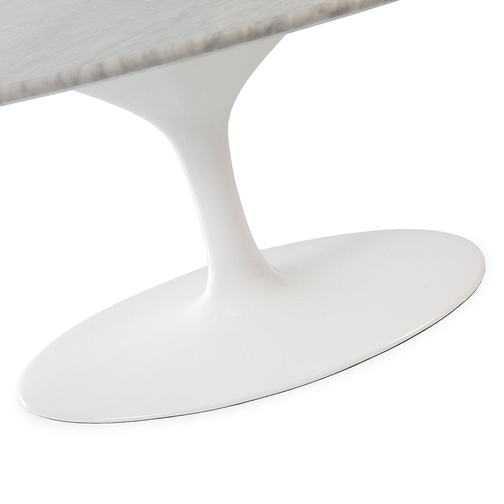 The shorter base of the oval Tulip Coffee Table can be seen here in white and carrying an Arabescato Marble top against a white backdrop