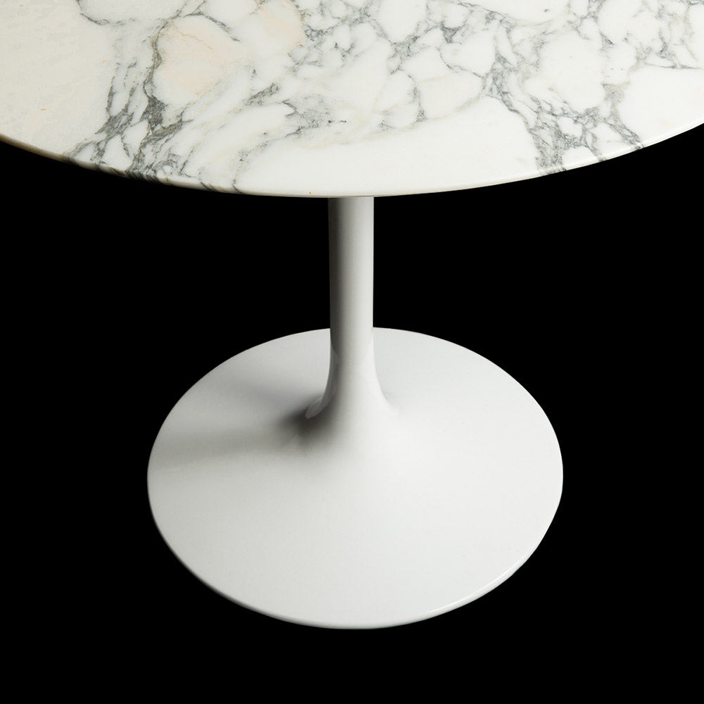 Looking angled and from above you can see both the trumpet like stem and fascinating patterned top of the Eero Saarinen Arabescato Marble Tulip Table