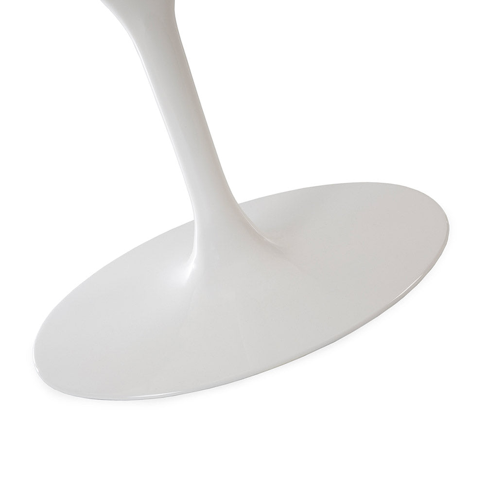 The Tulip table base in white is a sleek and curvy design that displays so much gracious style just like its namesake growing and blossoming at the top