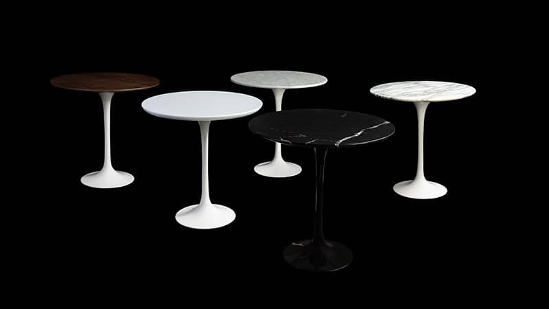 An image for choosing a category, featuring five Saarinen Tulip Side Tables in White Laminate, Carrara, Arabescato, Nero Marquina Marble & Walnut Veneer
