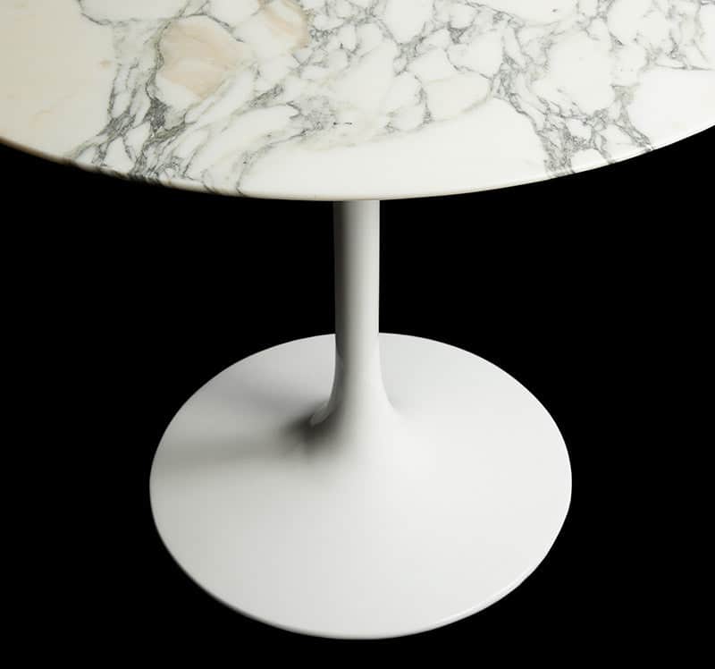 A Dining Table category choice image featuring a white marble Saarinen Tulip Table in a 120cm circular size sitting against a pure black backdrop