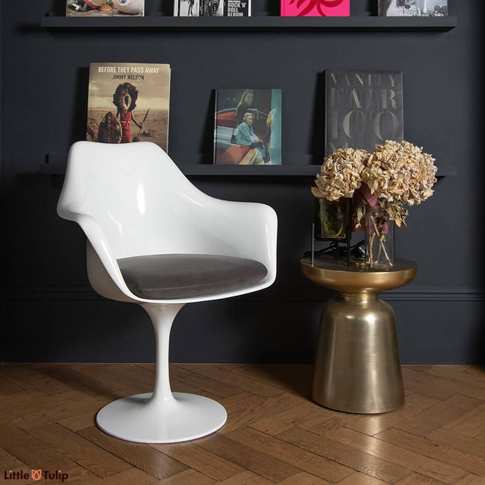A chair as timeless as a design can be, a Saarinen Tulip Arm Chair, here with a grey velveteen cushion, is the essence of design that simply never ages