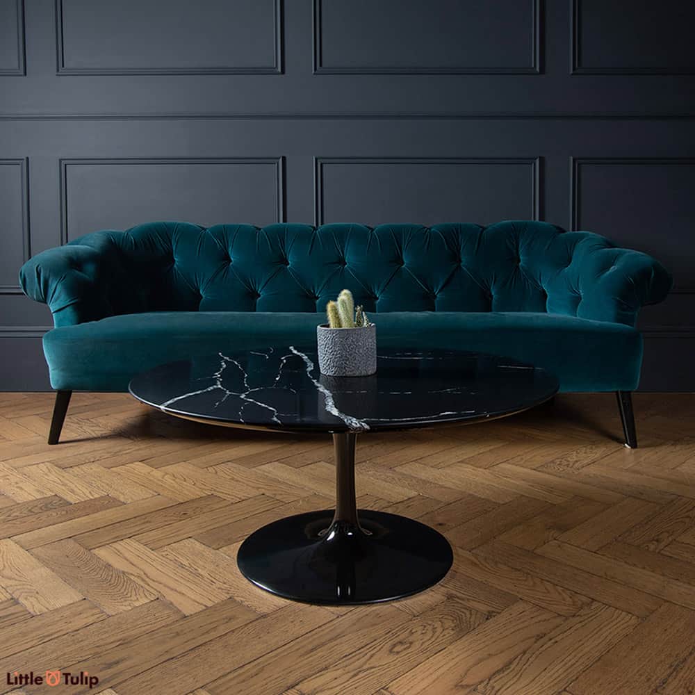 Jet black stone adorned with lightning strike veins is the hallmark of this Nero Marquina Saarinen Tulip Coffee table in a 90 cm circular shape