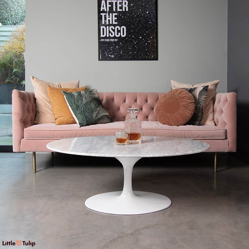 Versatility with a premium look, the Saarinen Oval 105 x 70 cm Tulip Coffee Table in a white Carrara marble is perfect for any living space and decor