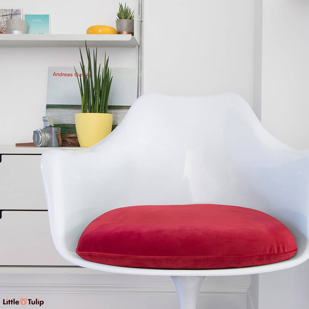 The seat pad for the Tulip Arm Chair, is no ordinary pillow, but a beautiful soft to the touch cushion in a rich and vibrant red luxury fabric