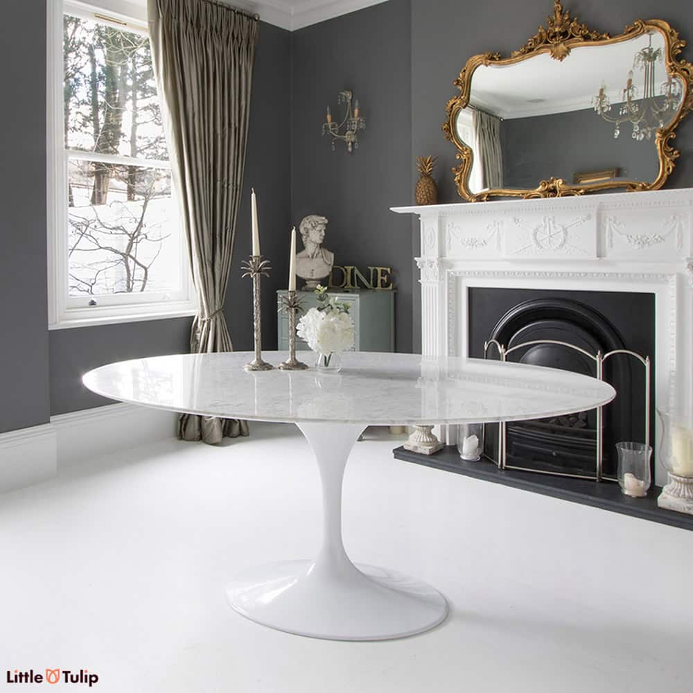 Making this dining room very special is an oval 170 cm Tulip Table made with a solid piece of Carrara Marble, Italy’s most famous natural stone export